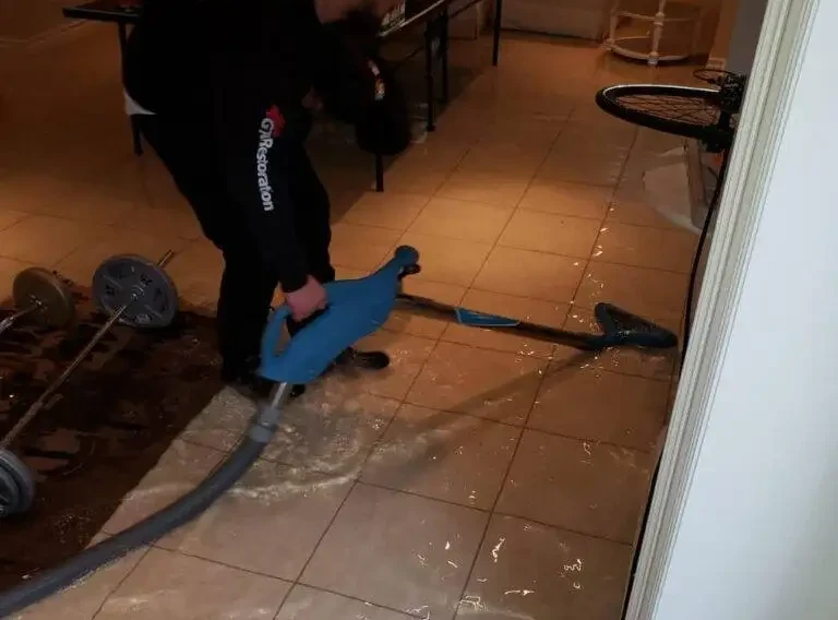 worker repairing water heater